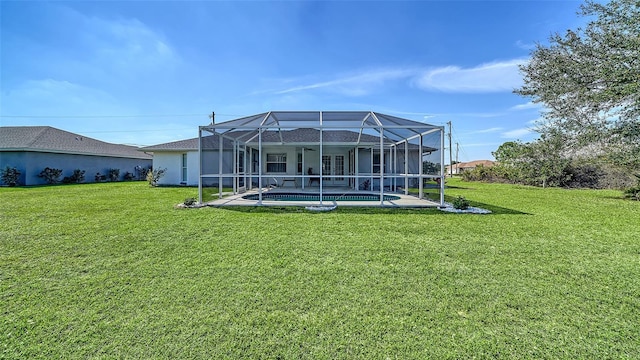 back of house with an outdoor pool, a lanai, and a lawn