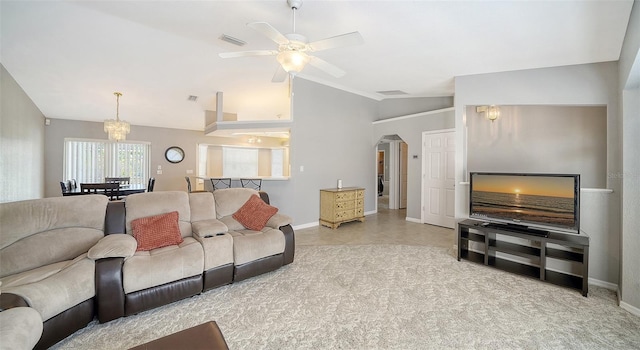 living area with lofted ceiling, ceiling fan, visible vents, and baseboards