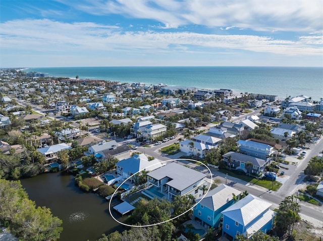 aerial view featuring a residential view and a water view