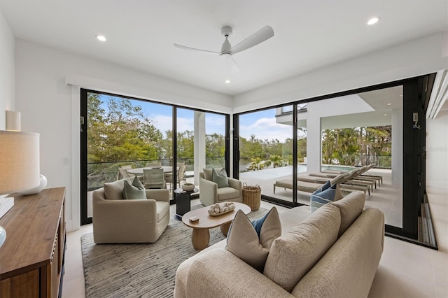 living room featuring recessed lighting and a ceiling fan