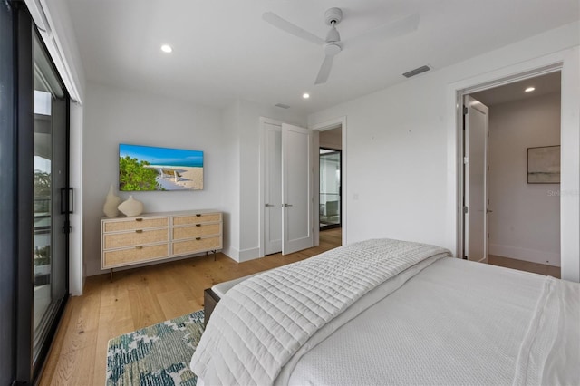 bedroom featuring recessed lighting, visible vents, baseboards, and light wood finished floors