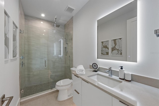 full bath with visible vents, toilet, a stall shower, recessed lighting, and vanity