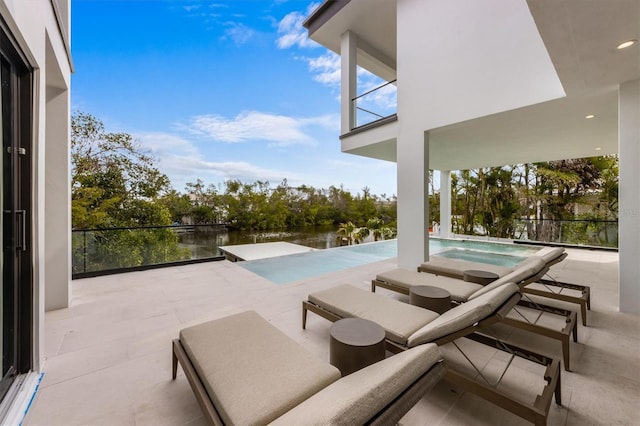 pool featuring a patio area