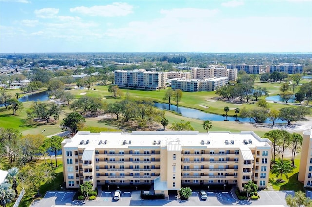 aerial view featuring view of golf course and a water view