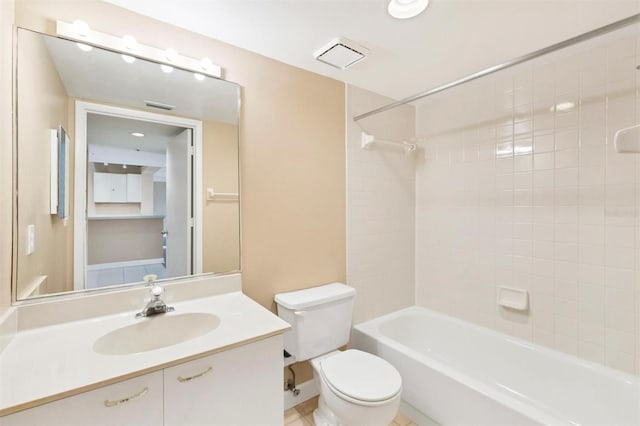 full bathroom with shower / bathtub combination, visible vents, vanity, and toilet