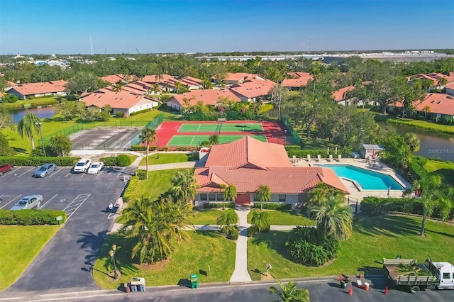 bird's eye view featuring a residential view and a water view