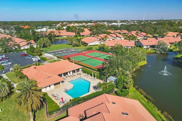 bird's eye view with a residential view and a water view