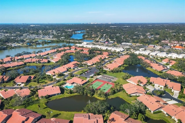 aerial view with a residential view and a water view