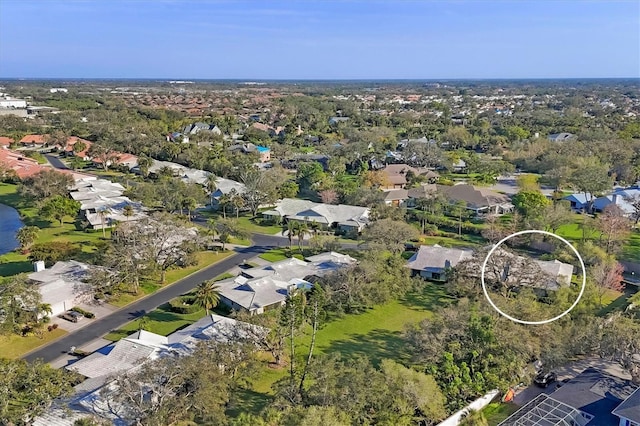 birds eye view of property with a residential view