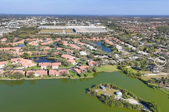 aerial view featuring a water view and a residential view