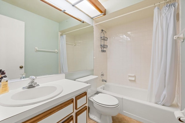 bathroom with shower / bath combo, vanity, and toilet