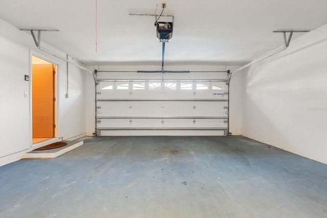 garage featuring a garage door opener