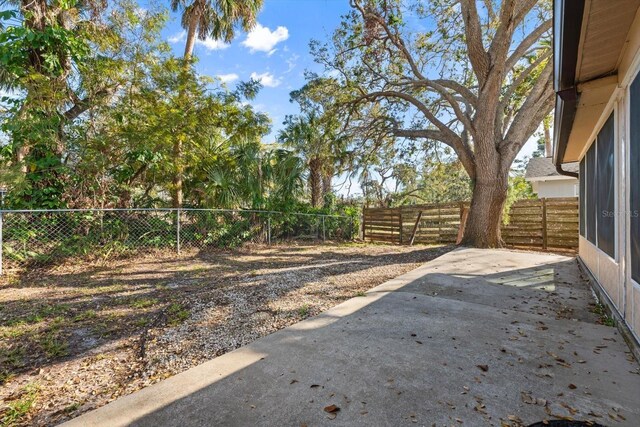 view of yard featuring a fenced backyard and a patio