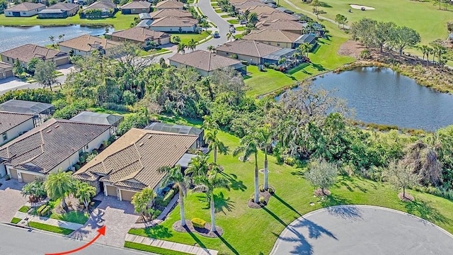 bird's eye view with a residential view and a water view