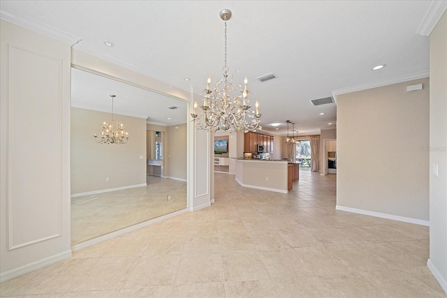 spare room featuring ornamental molding, visible vents, and a notable chandelier