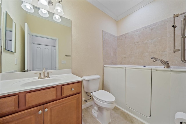 full bath with a tub to relax in, toilet, vanity, tile patterned floors, and crown molding