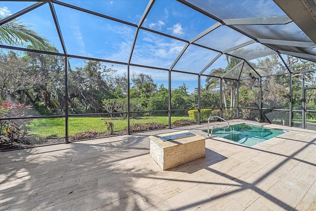 outdoor pool featuring a patio area and glass enclosure