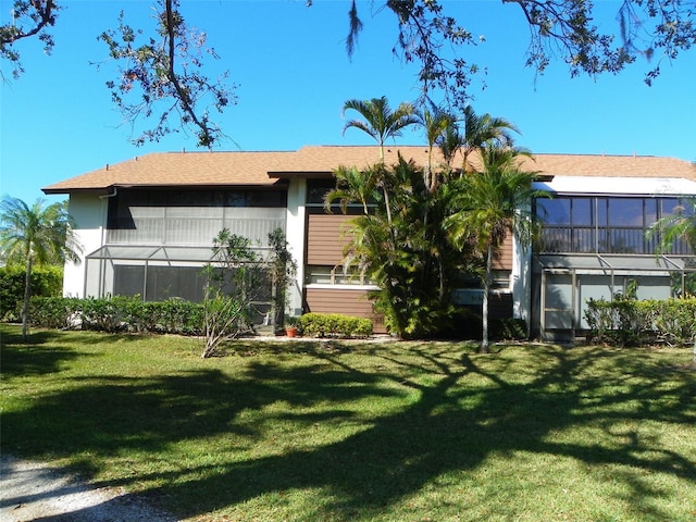 exterior space with a lawn