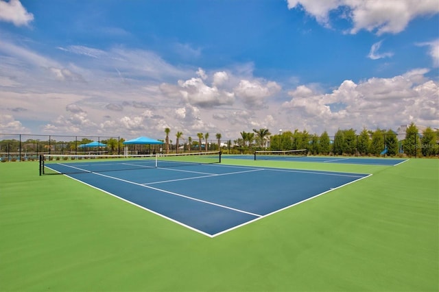 view of sport court with fence