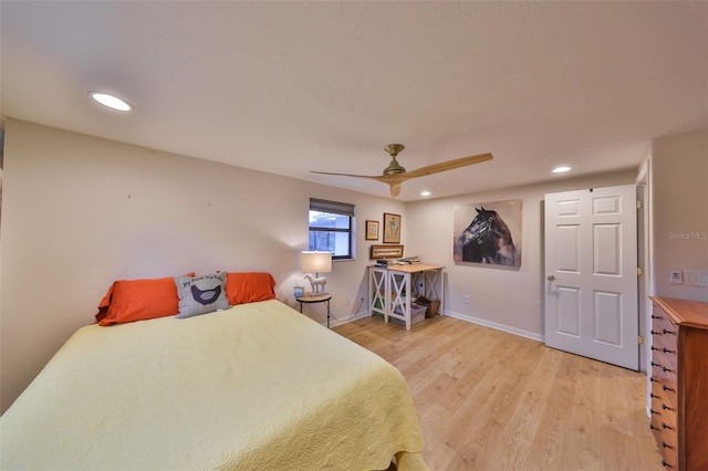 bedroom with light wood-style floors, ceiling fan, baseboards, and recessed lighting