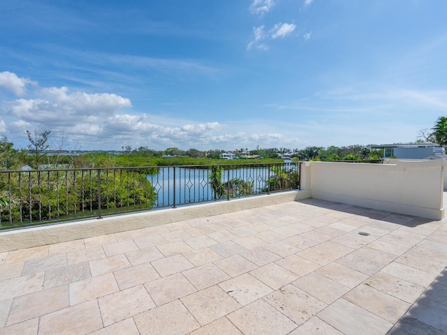 view of patio featuring a water view