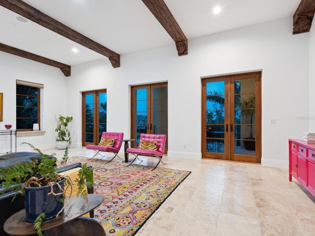 living room with beam ceiling, recessed lighting, french doors, and baseboards