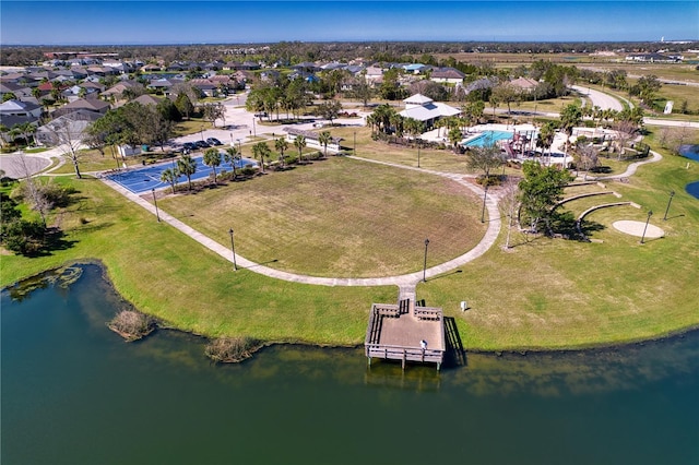 drone / aerial view featuring a water view