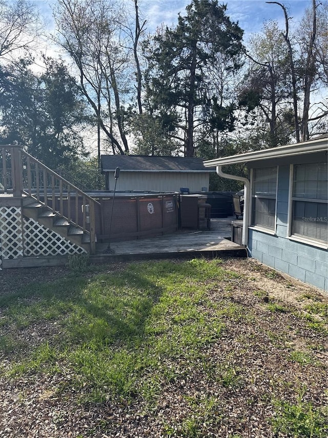 view of yard featuring a wooden deck