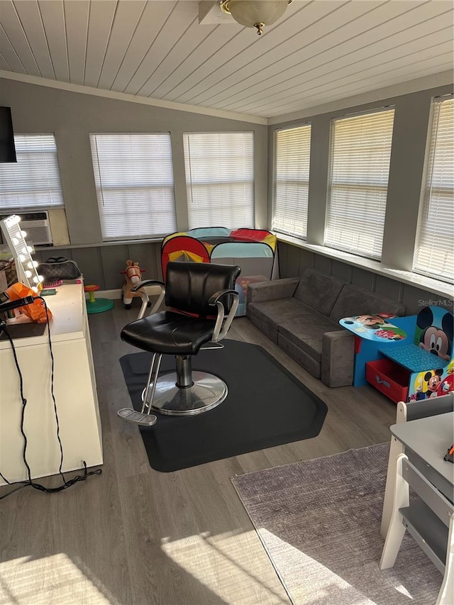 sunroom / solarium featuring wood ceiling