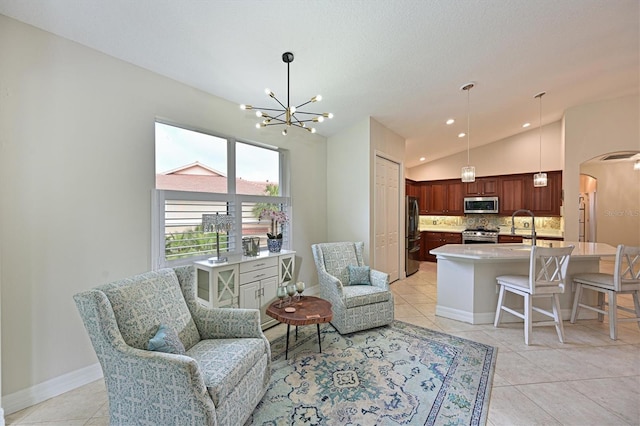 interior space with light tile patterned floors, baseboards, arched walkways, lofted ceiling, and an inviting chandelier