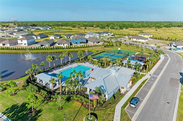 aerial view featuring a water view and a residential view