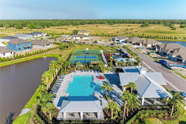 aerial view featuring a water view and a residential view