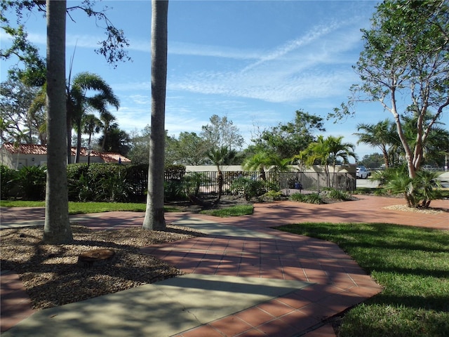 view of property's community with fence