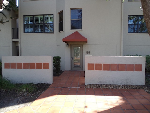 exterior space featuring stucco siding