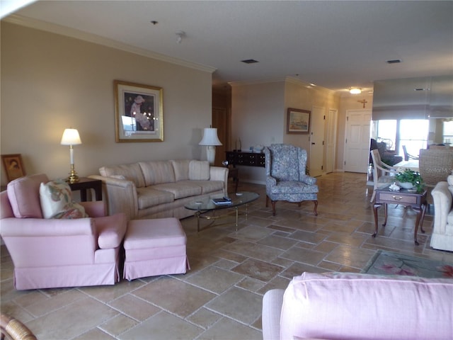 living area featuring stone finish floor and ornamental molding