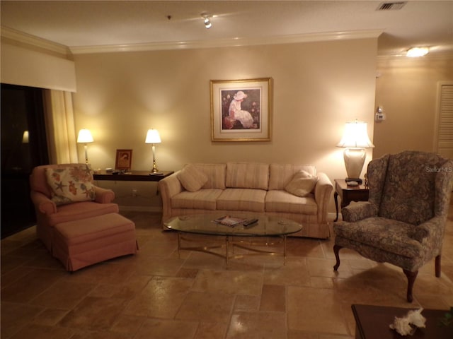 living area with stone finish floor, visible vents, and ornamental molding