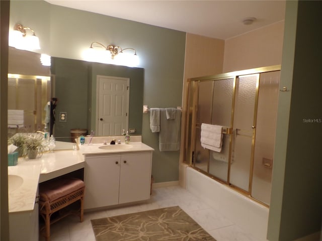 full bath with tile patterned flooring, combined bath / shower with glass door, and vanity