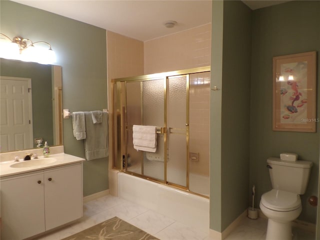 full bathroom featuring toilet, shower / bath combination with glass door, vanity, baseboards, and tile patterned floors