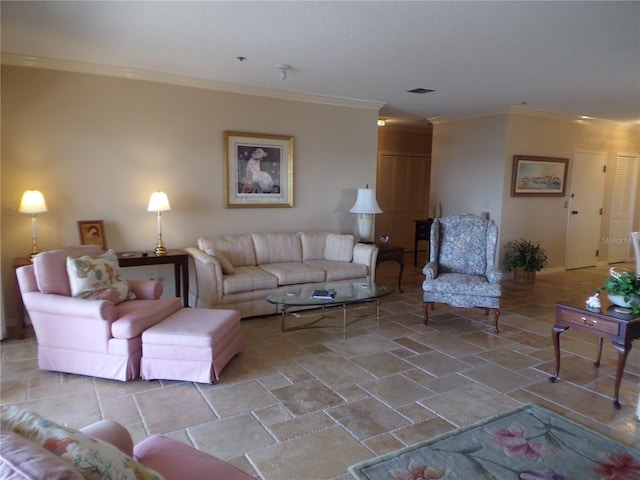 living area with stone finish floor, crown molding, and baseboards