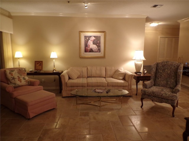 living room with ornamental molding, stone tile flooring, and visible vents