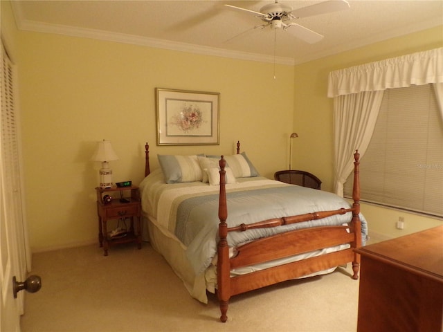 bedroom featuring light carpet, a ceiling fan, and crown molding