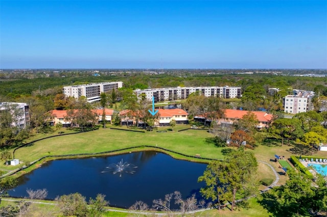 birds eye view of property with a water view