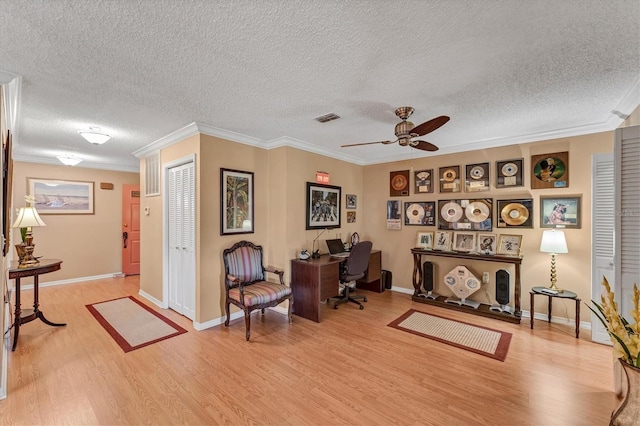 8140 Terrace Garden Dr N Unit 103, Saint Petersburg, FL 33709 - office space with light wood-type flooring, a textured ceiling, a ceiling fan, crown molding, and baseboards