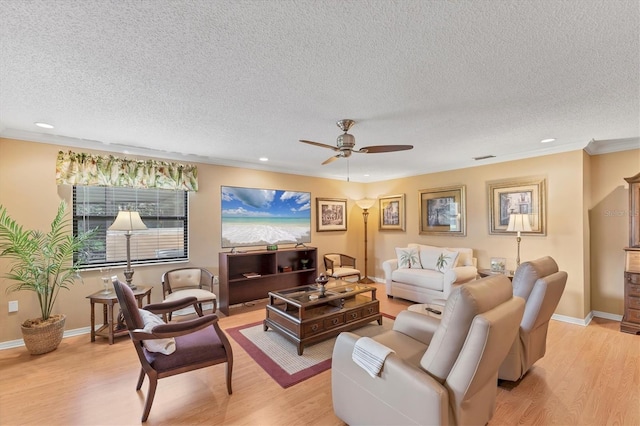 8140 Terrace Garden Dr N Unit 103, Saint Petersburg, FL 33709 - living room with a ceiling fan, light wood-style flooring, a textured ceiling, recessed lighting, and baseboards
