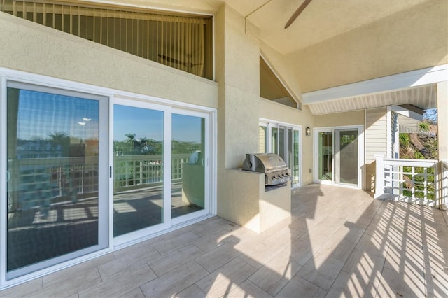 view of patio with an outdoor kitchen and area for grilling