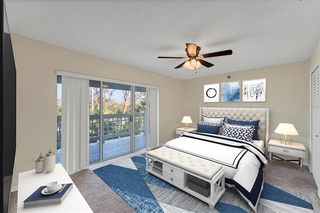 bedroom featuring access to exterior, carpet floors, and a ceiling fan