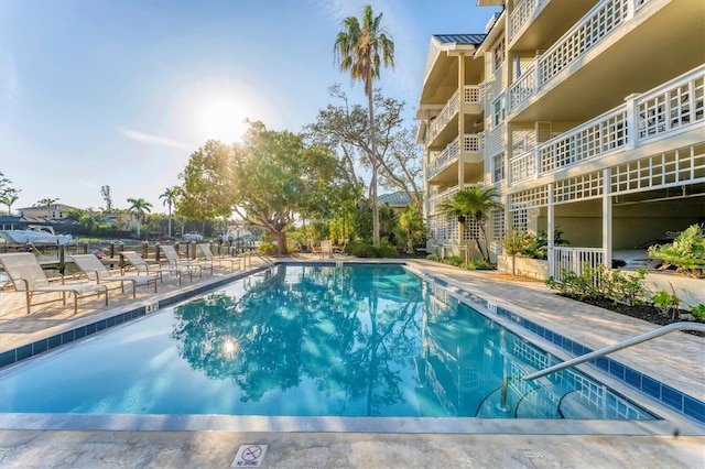 community pool featuring a patio