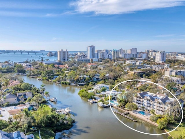 bird's eye view featuring a city view and a water view