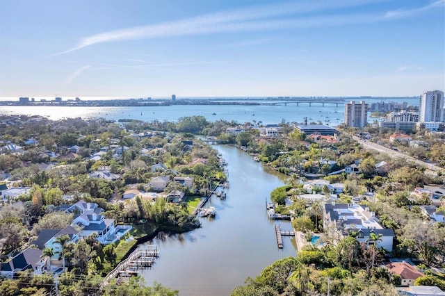 bird's eye view with a water view