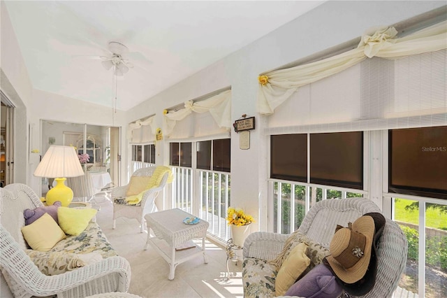 sunroom with a ceiling fan